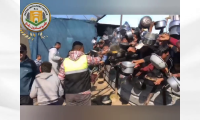 إعداد وتوزيع وجبات الطعام لآلاف النازحين في مواصي خانيونس - فيديو توثيقي 102 من حملة طوفان الأمل
