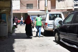 توزيع 200 طرد غذائي ضمن المرحلة الثالثة بالتعاون مع IHH-003