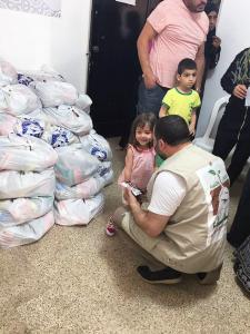 توزيع 200 طرد غذائي ضمن المرحلة الثالثة بالتعاون-009