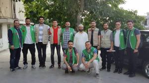 توزيع 400 طرد غذائي في البيرة بالتعاون مع IHH-005