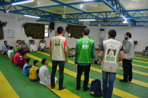 توزيع 400 طرد غذائي في البيرة بالتعاون مع IHH-007