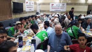 توزيع 400 طرد غذائي في البيرة بالتعاون مع IHH-009