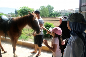 ركوب الخيل، باتشوورك، سباحة، ومهارات مختلفة في الأسبوع الثالث من دورة عالمي الصيفي في طرابلس