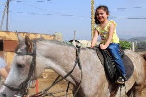 ركوب الخيل، باتشوورك، سباحة، ومهارات مختلفة في الأسبوع الثالث من دورة عالمي الصيفي في طرابلس