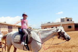 ركوب خيل ورحلة بحرية.. النشاط الثاني لدورة فتيات الفرقان في طرابلس
