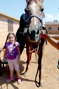 ركوب خيل ورحلة بحرية.. النشاط الثاني لدورة فتيات الفرقان في طرابلس